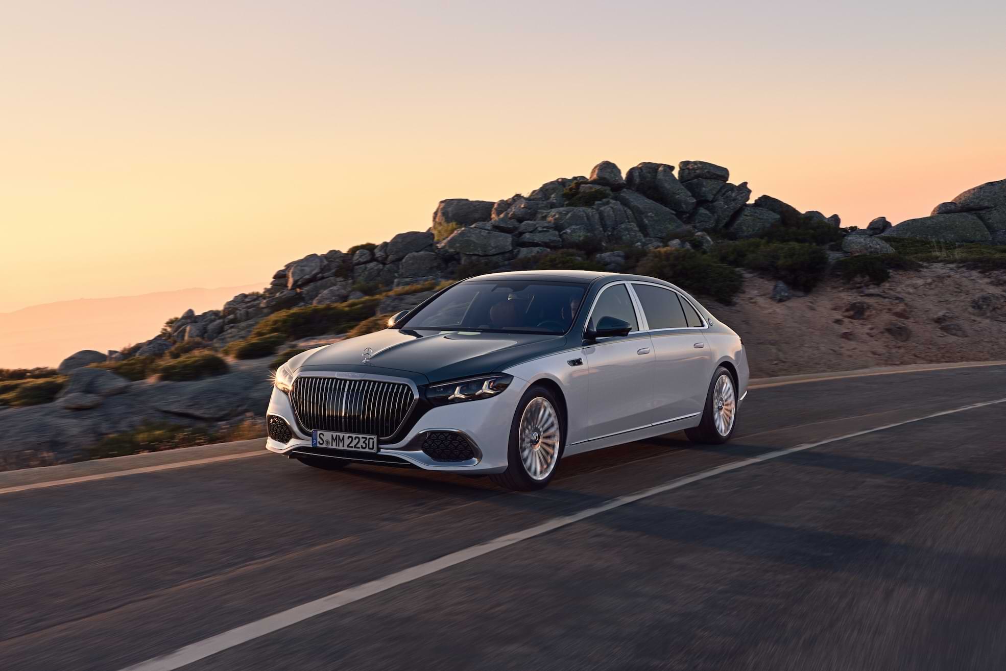 The New Mercedes-Maybach S-Class: A Study in Modern Luxury Mercedes-Maybach S-Class 2026 driving on an open road at sunset with luxury exterior design and premium detailing