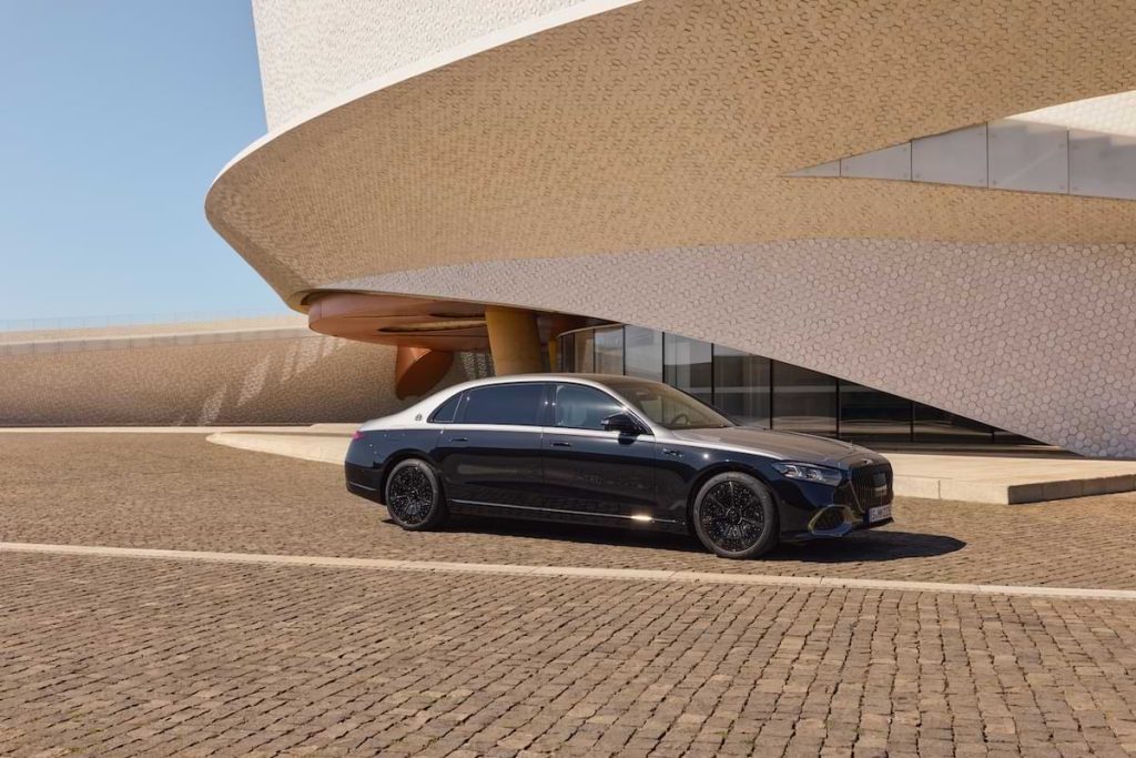 Mercedes-Maybach S-Class 2026 exterior parked near contemporary architecture showcasing luxury design and premium styling