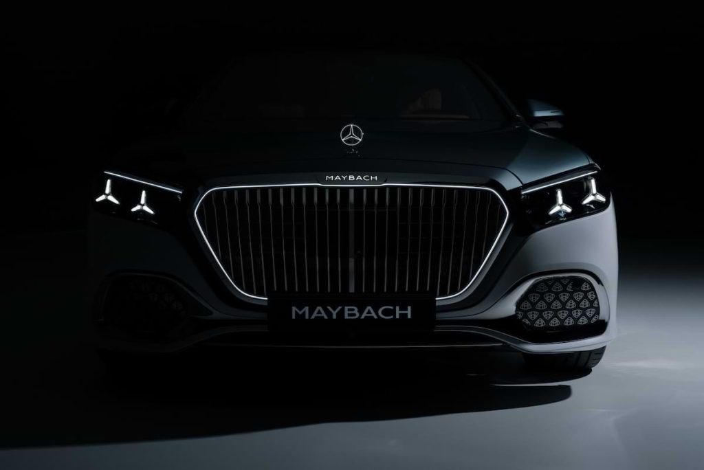 Mercedes-Maybach S-Class 2026 front grille and headlights in dark studio lighting showcasing luxury design details